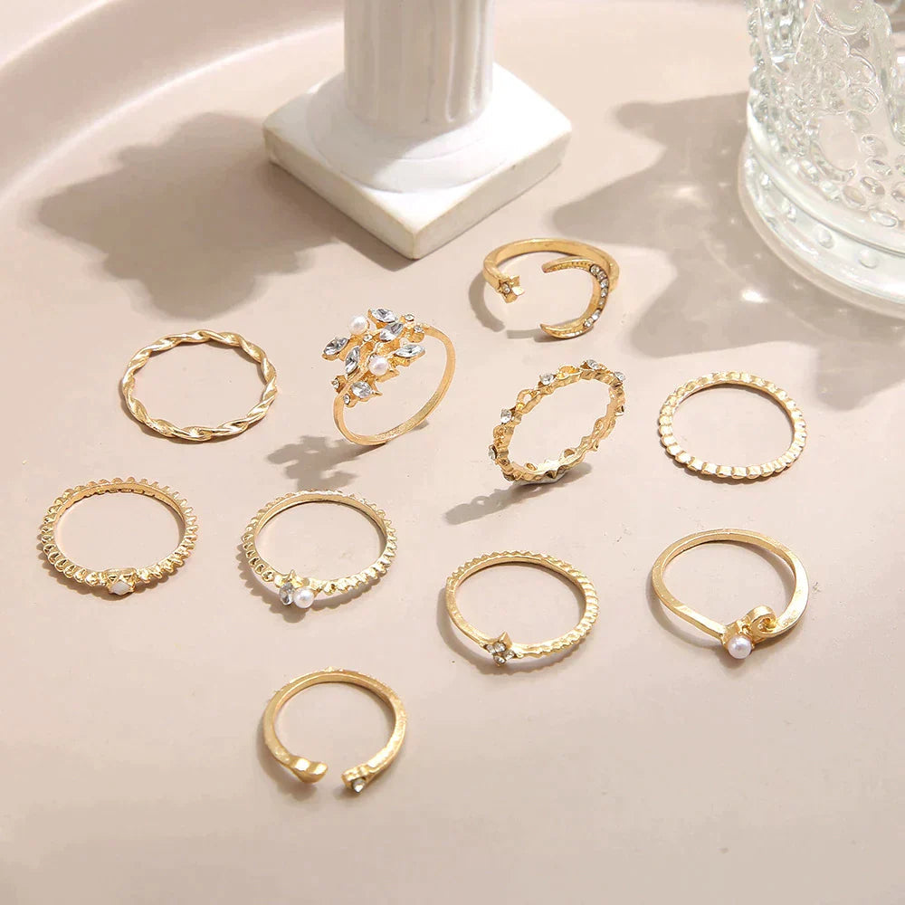 Close-up of a 20-piece gold & silver boho ring set, showing varied intricate designs for women's fashion.