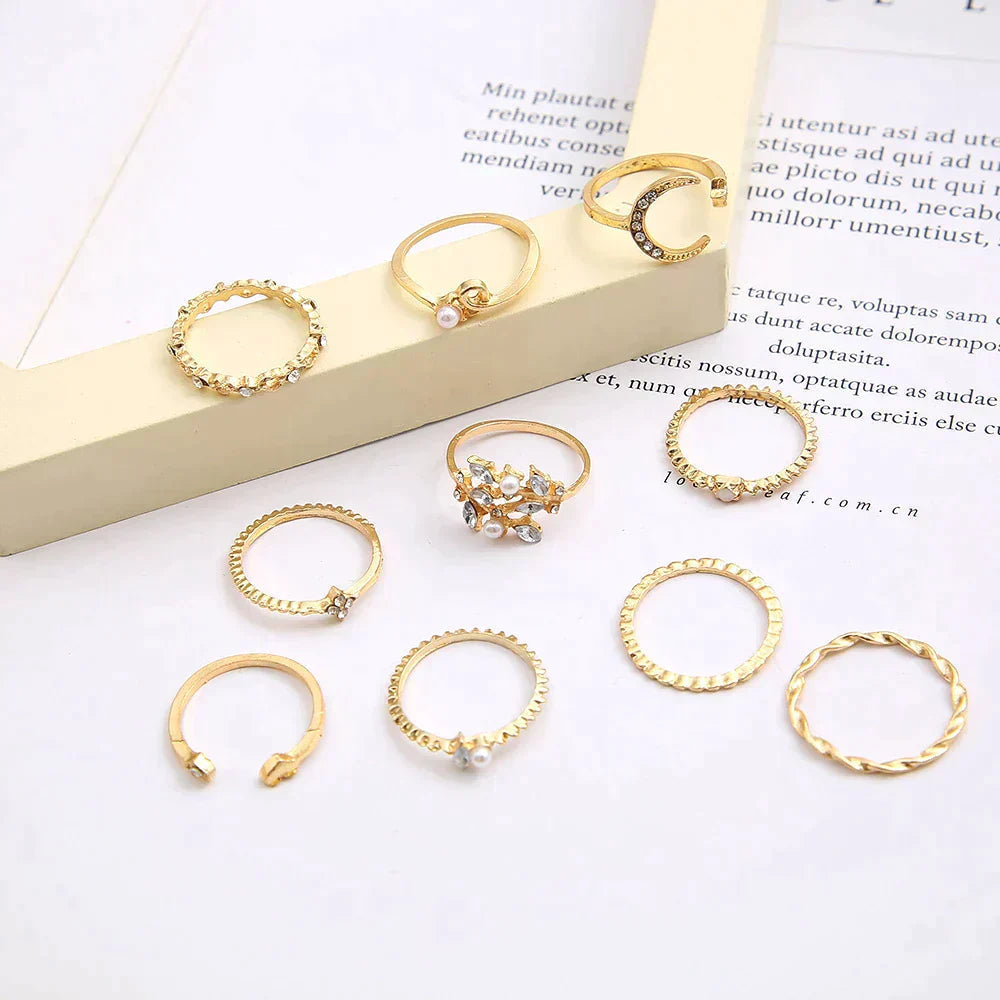 Trendy 20-piece women's jewelry set: a collection of gold & silver boho rings with diverse styles.
