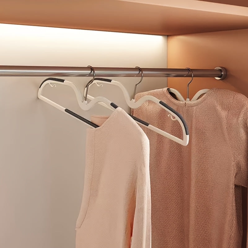 Home storage solution: 40 non-slip space-saving plastic hangers with rotating hooks for organized closets.