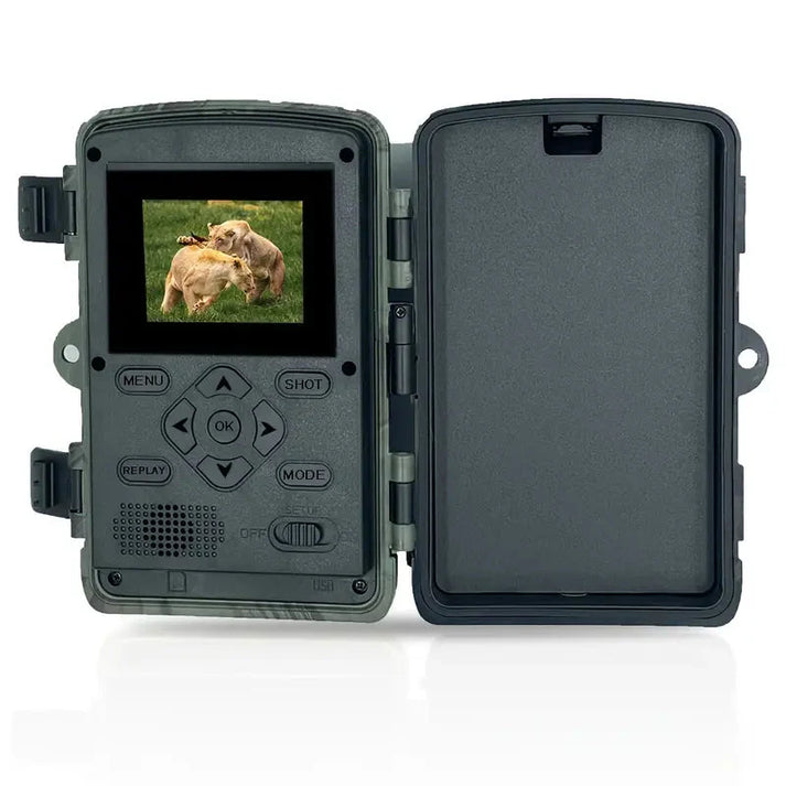 Wildlife trail camera with app control, showing a smartphone connected for remote monitoring and settings.