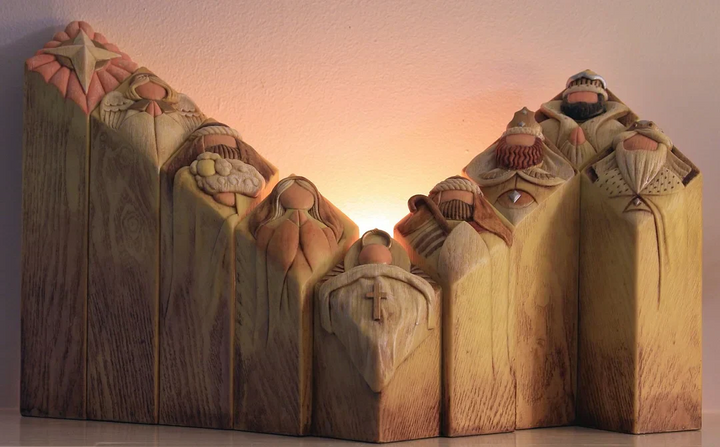 Elegant pillar statues depicting the Nativity story, perfect for holiday display.