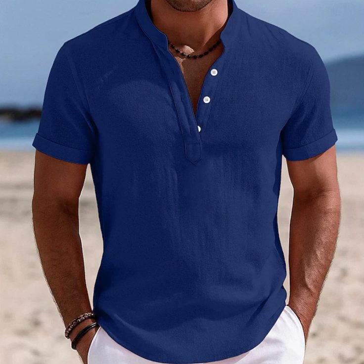 Close-up of a white men's casual short sleeve button-up shirt, a versatile wardrobe essential.
