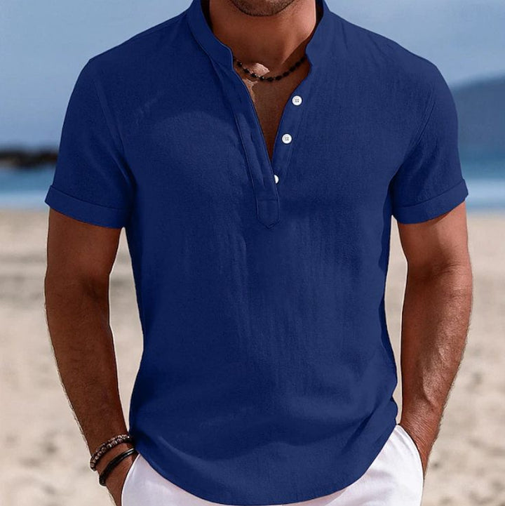 Close-up of a white men's casual short sleeve button-up shirt, a versatile wardrobe essential.