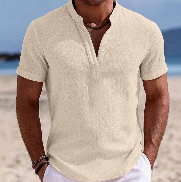 Patterned casual short sleeve button-front shirt for men, a trendy summer top.