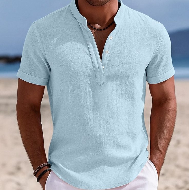Folded blue men's casual short sleeve shirt, ready for summer outings and everyday wear.