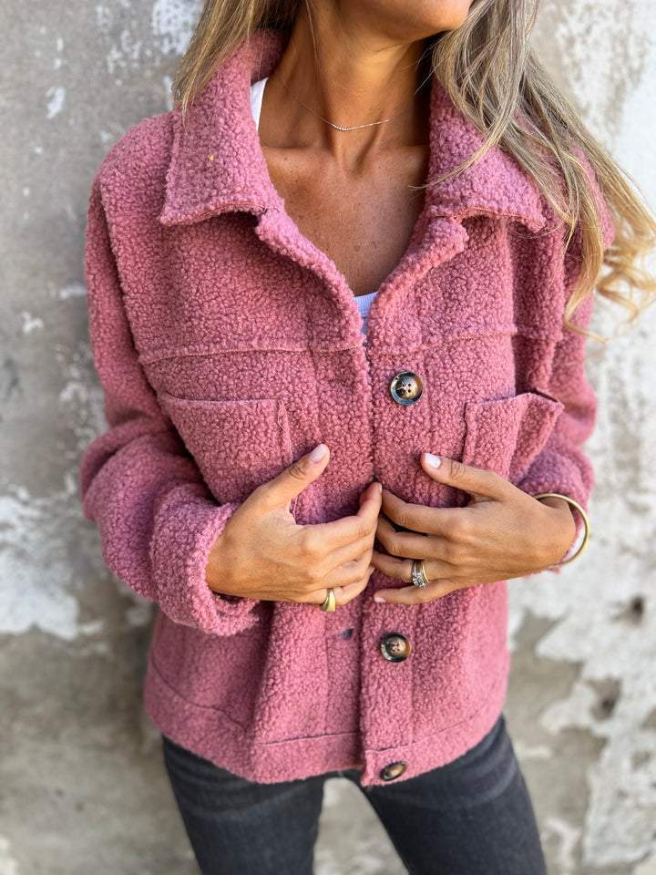 A stylish women's cozy jacket in a relaxed, hip-length fit, perfect for everyday fall and spring comfort.