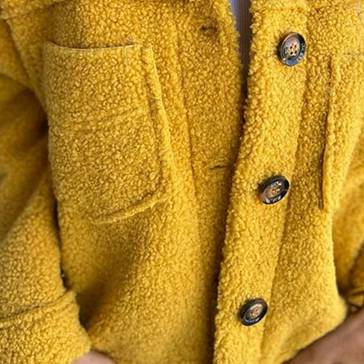Yellow women's hip-length cozy jacket with relaxed fit. Stylish casual outerwear for everyday comfort in fall & spring.