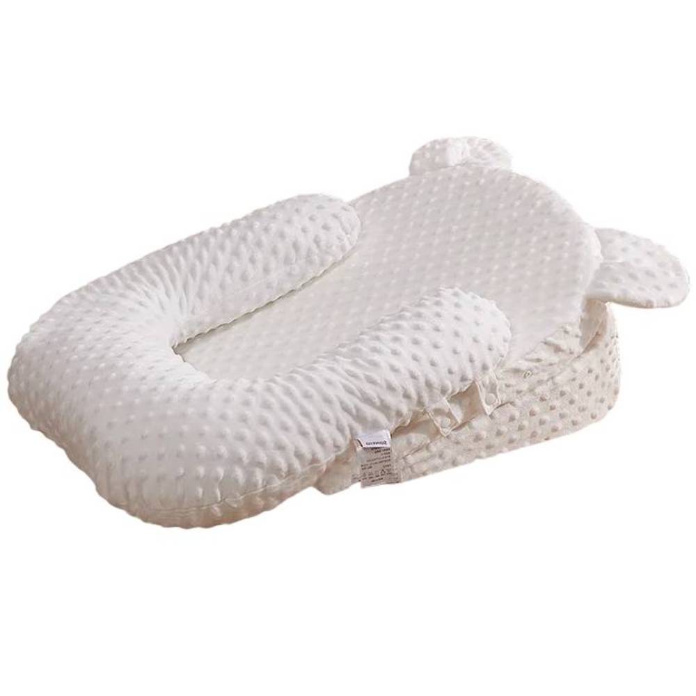 Adjustable baby feeding pillow for comfortable nursing and reduced spit-up.