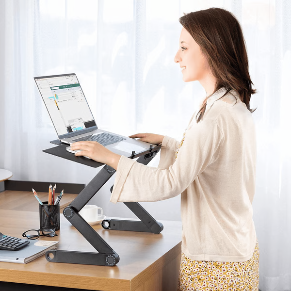 Ergonomic laptop stand for better posture, reducing neck & back pain during desk or couch work.