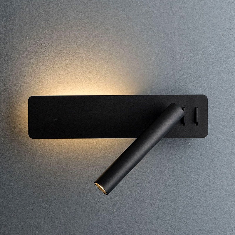 Modern minimalist LED wall light, perfect as an adjustable bedside reading lamp for focused light.