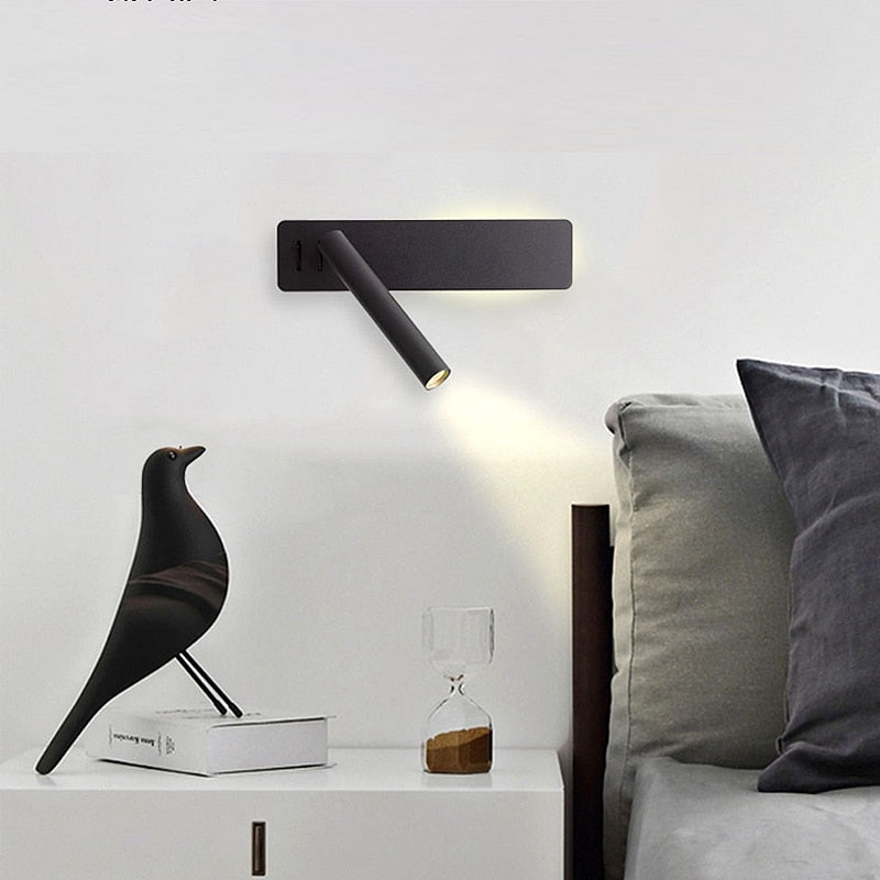 Sleek wall-mounted LED reading lamp, providing focused, adjustable light for bedrooms and home offices.