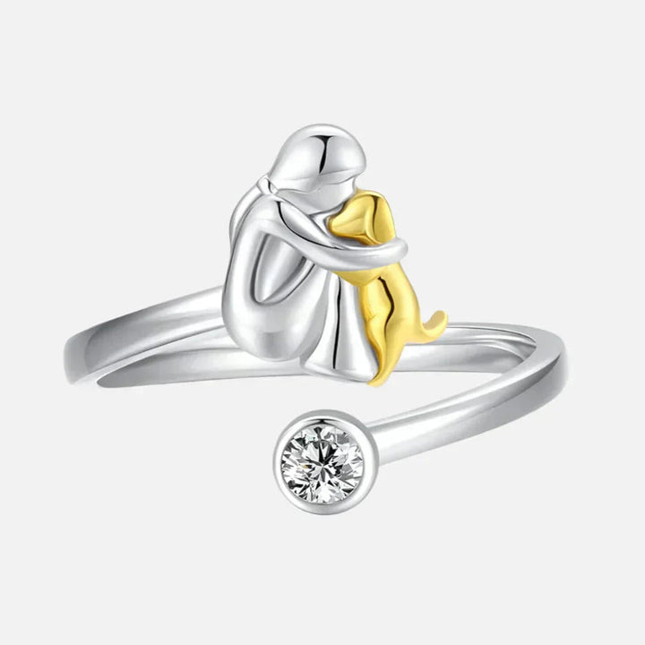 Adjustable silver dog ring with gold accent, perfect hypoallergenic women's jewelry for pet lovers.