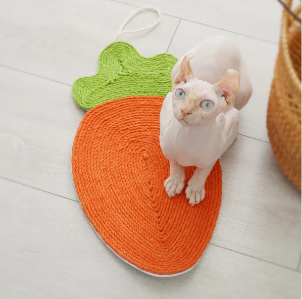 Adorable cat scratching mat in a fun fruit shape, perfect for healthy claws & playful felines.