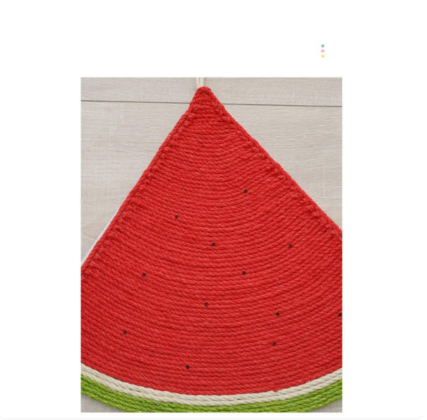 Durable fruit-shaped scratching mat providing essential claw care for cats, blends with home decor.