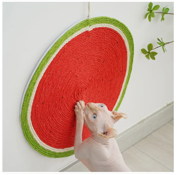 Vibrant fruit-shaped cat scratcher mat for endless fun, promoting feline claw health & pet play.