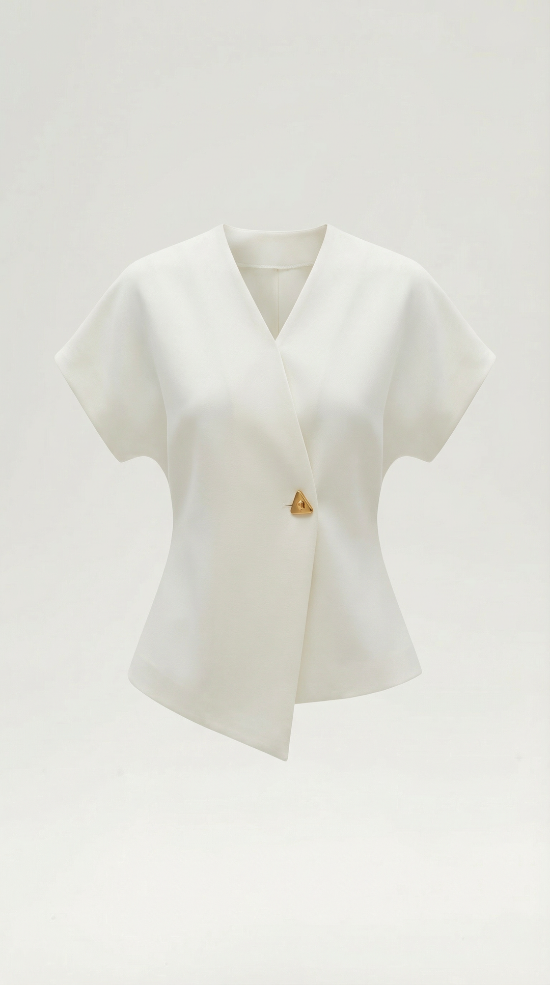Model wearing the Amy V-Neck Blouse, highlighting its feminine design and chic, effortless style.