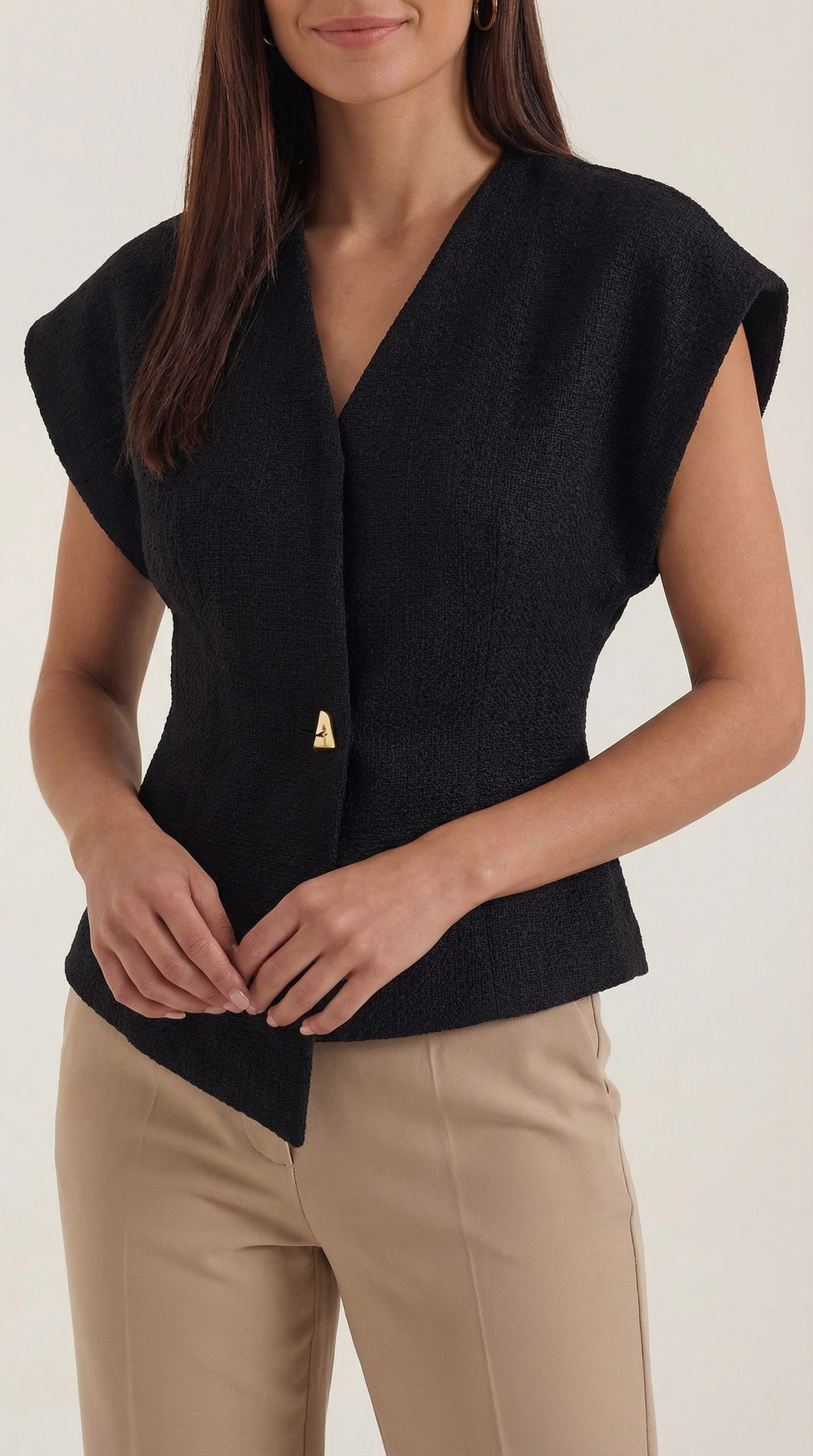 Back view of the Amy V-Neck Blouse, demonstrating its elegant drape and flattering cut.