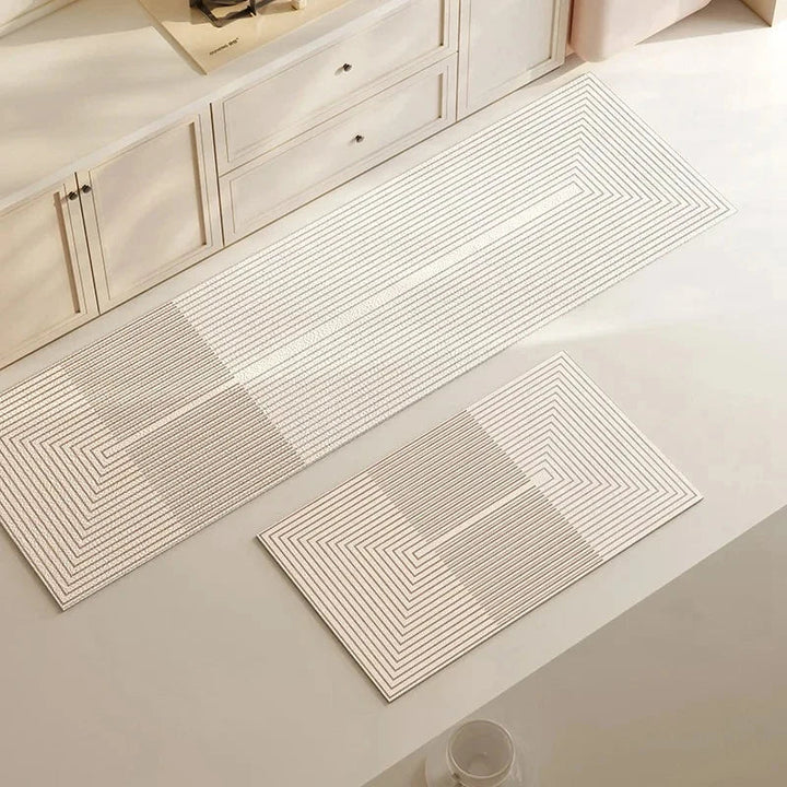 Stylish kitchen mat featuring absorbent surface and ergonomic cushioning for all-day standing.