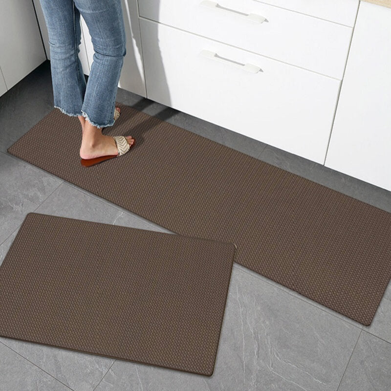 Anti-fatigue PVC kitchen mat with cushioned comfort. Stain-resistant, waterproof, and anti-slip for busy kitchens.