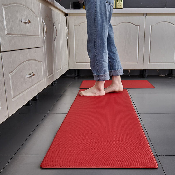 Easy-clean waterproof kitchen rug. Stain-resistant PVC mat with cushioned anti-fatigue for busy households.