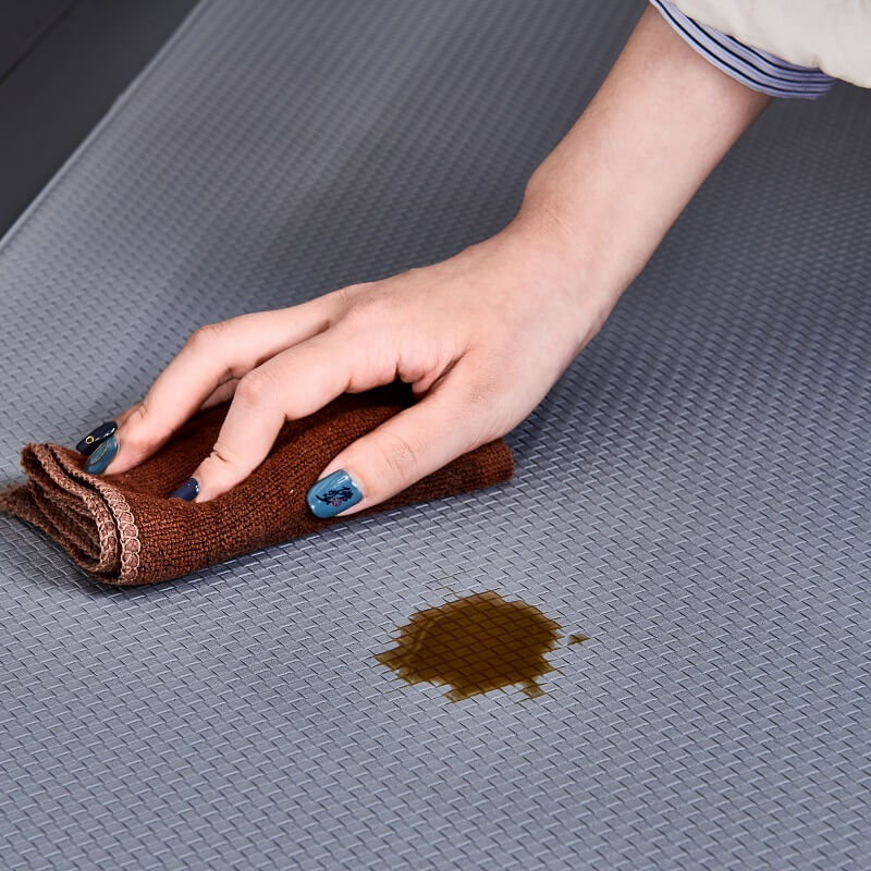 Modern anti-slip kitchen rug. Waterproof PVC mat offering cushioned comfort and floor protection for your home.