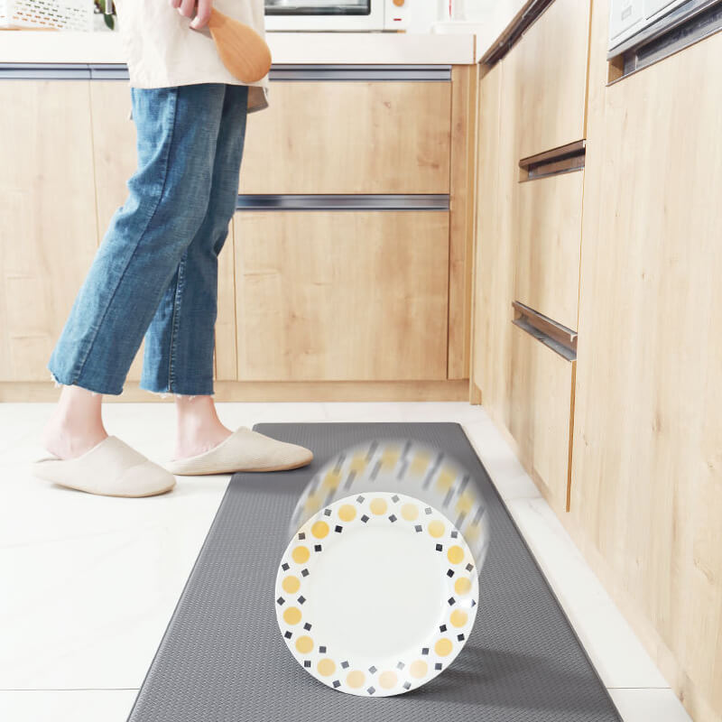 Safe anti-slip kitchen rug. Waterproof and anti-fatigue mat with cushioned support for kitchen safety & comfort.