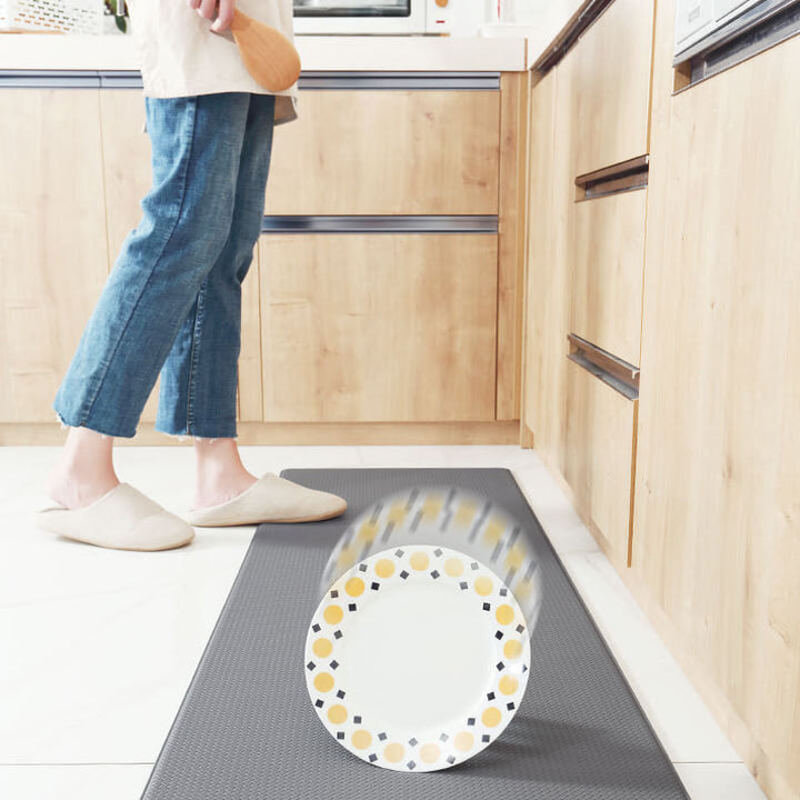 Safe anti-slip kitchen rug. Waterproof and anti-fatigue mat with cushioned support for kitchen safety & comfort.