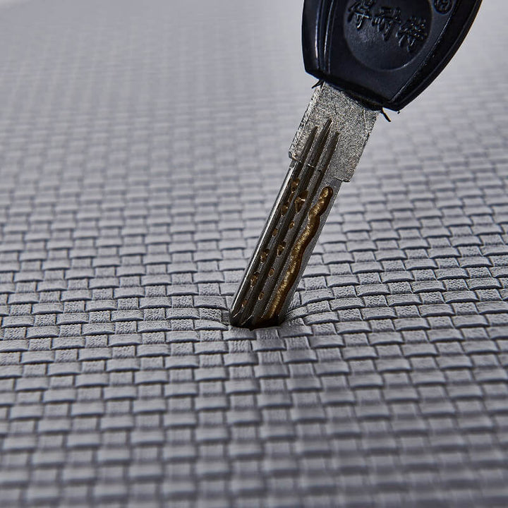 Durable waterproof kitchen mat. PVC floor protection rug with anti-slip, cushioned, and stain-resistant features.