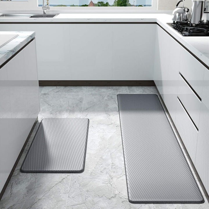 Stylish gray anti-slip kitchen rug. Waterproof comfort mat for modern home decor, cushioned & fatigue relief.