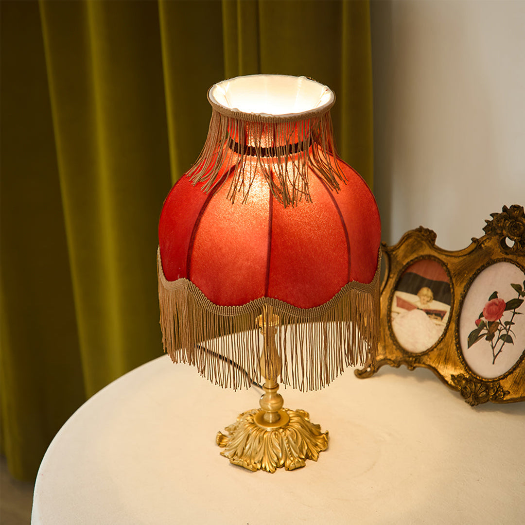 Arina red lamp: classic design, brass details, perfect for any table, chic home decor.