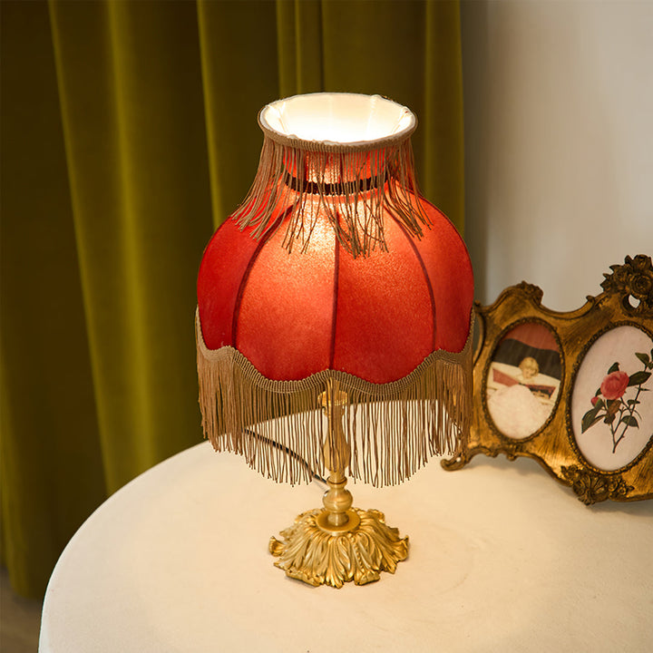 Arina red lamp: classic design, brass details, perfect for any table, chic home decor.