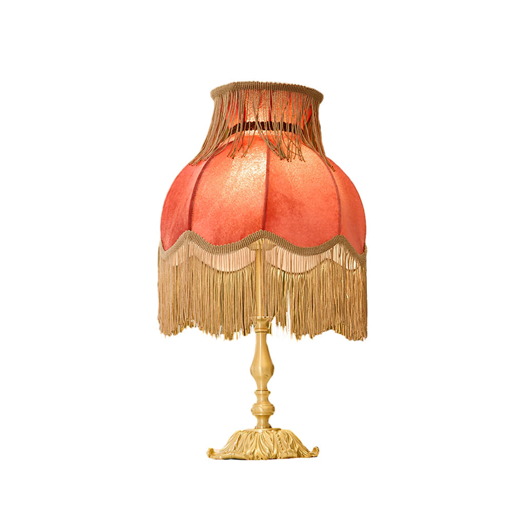 Statement Arina red and brass lamp, ideal for adding eclectic charm to any room.