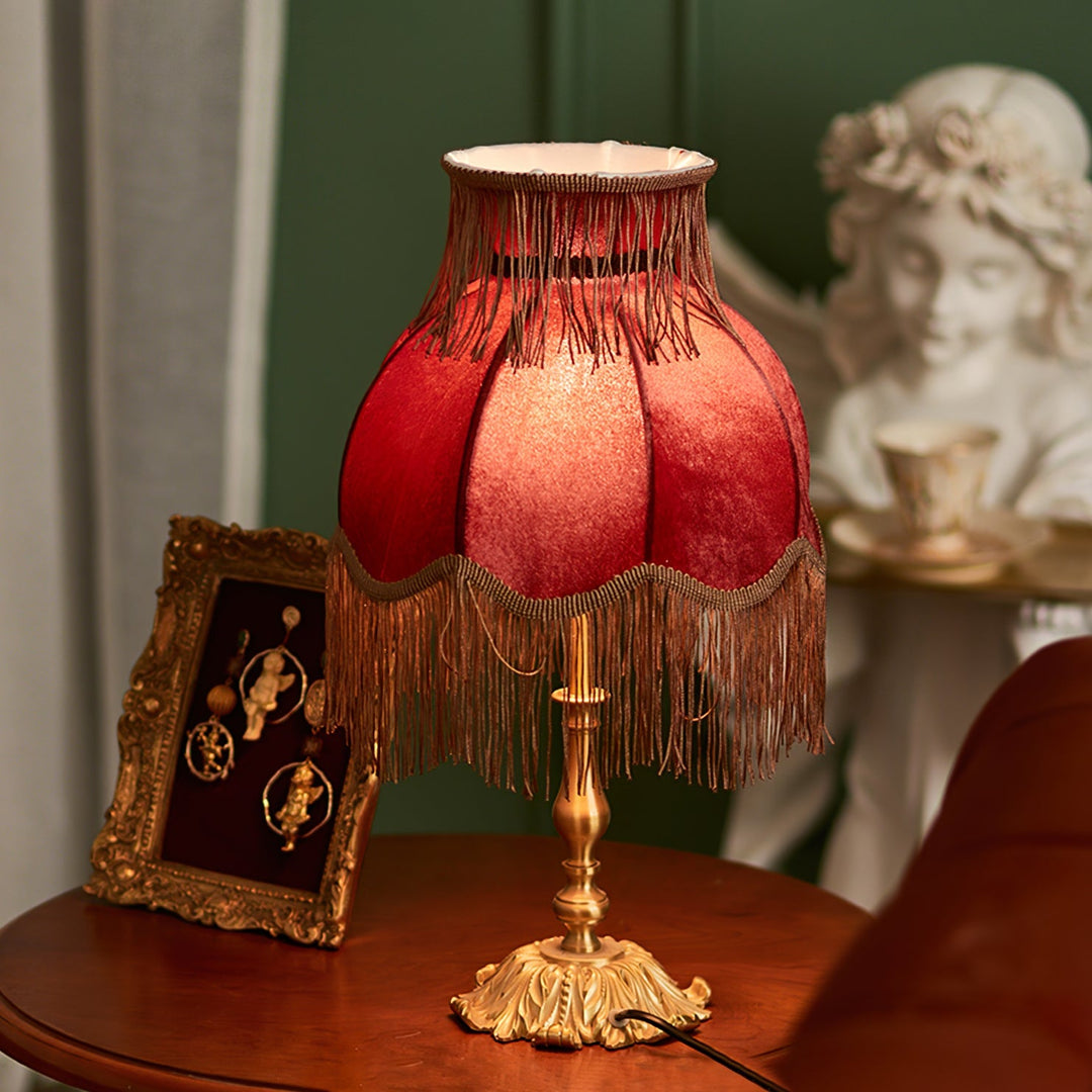 Bohemian red and brass table lamp by Arina, adds a classic touch to any room.