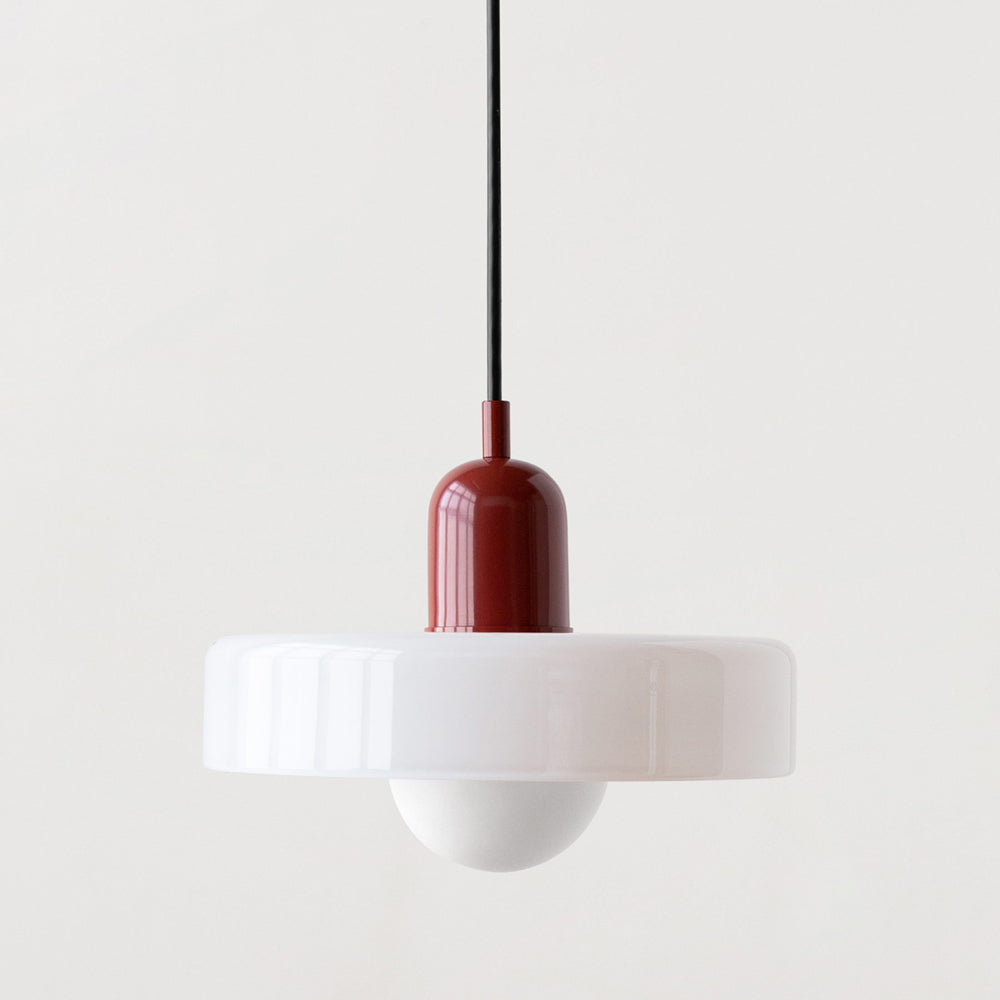 Artistic Bauhaus glass pendant lamp with warm ambient lighting.