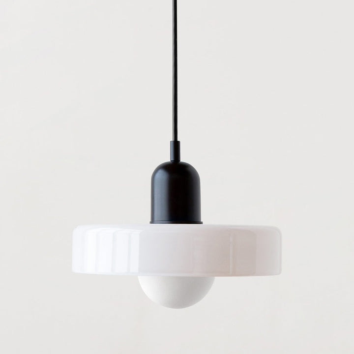 A stylish Bauhaus pendant lamp with a focus on colored glass details.