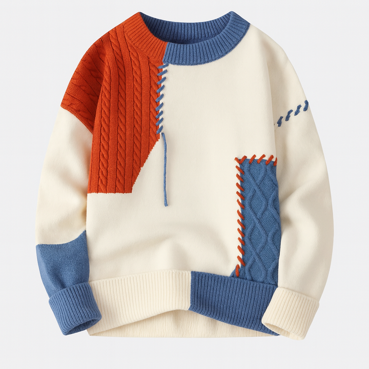 Close-up of the Arty Patch Sweater showcasing intricate colorblock knit detail.