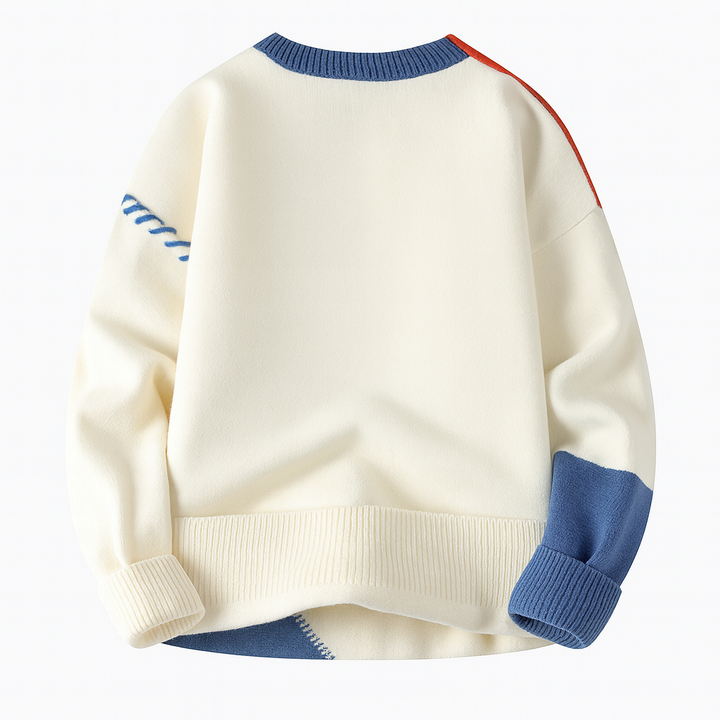 Stylish women's casual knit sweater featuring a bold, artistic patchwork pattern.