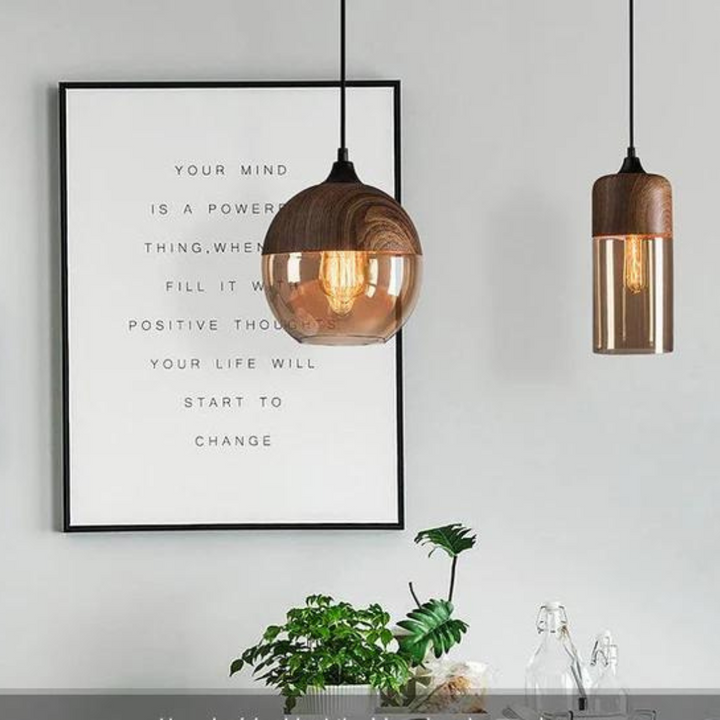 Arven pendant light featuring a blend of wood and glass elements