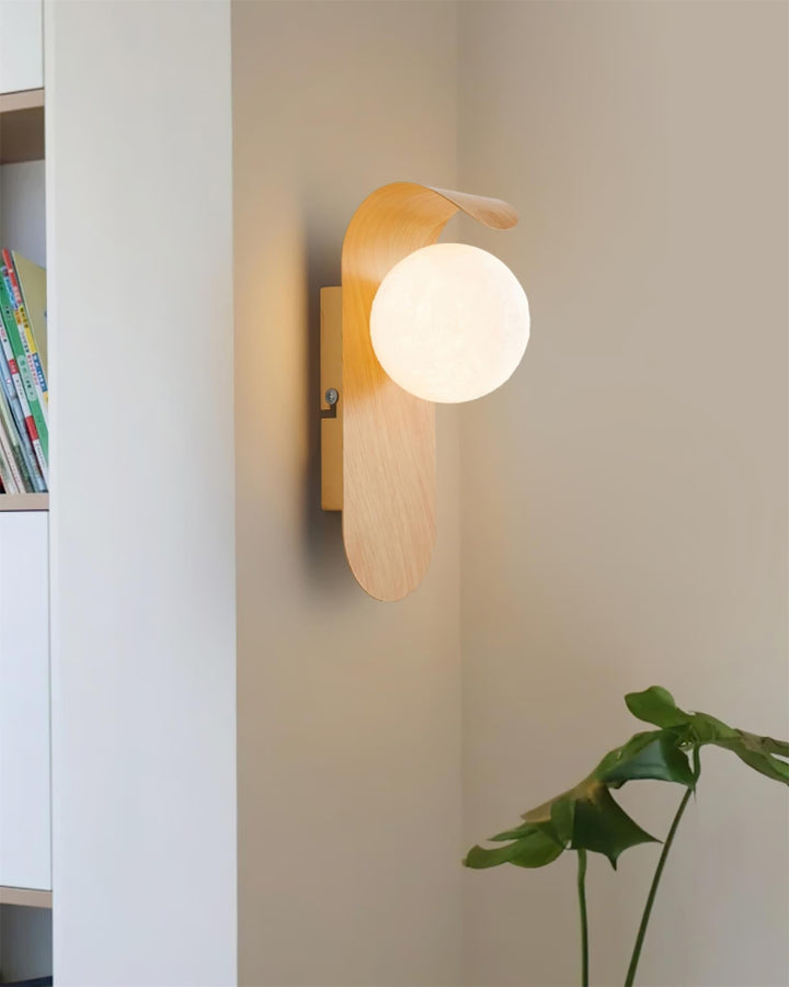 Elegant Ashvale LED wall lamp with wood effect, ideal for ambient indoor lighting.