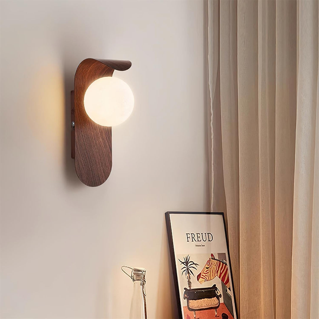 Decorative LED wall light with wood effect, perfect for a cozy bedroom or hallway.