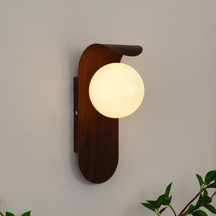 Modern wood effect LED wall fixture, ideal for creating ambient indoor light.