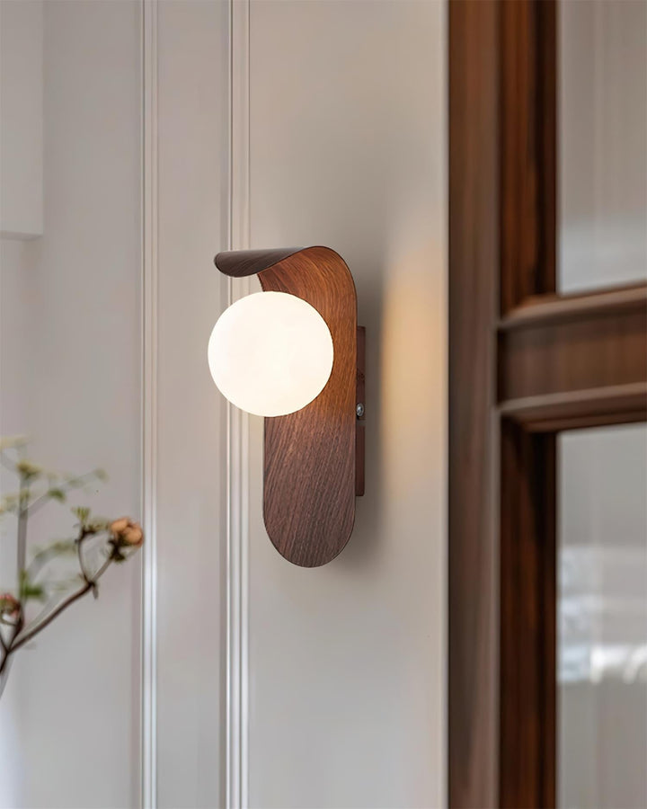 Chic wood effect LED indoor wall light, perfect for modern bedroom decor.