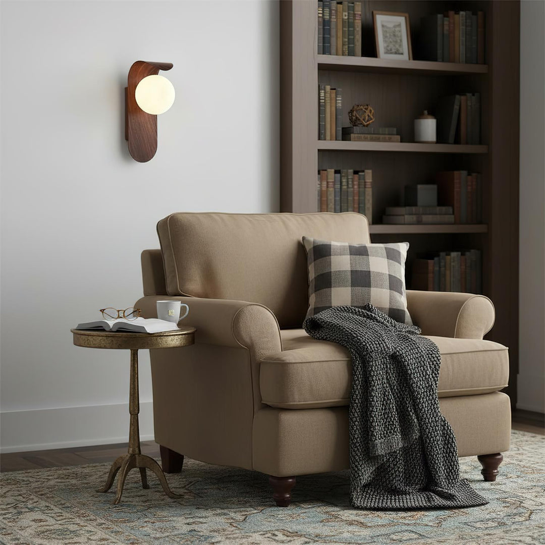 Elegant Ashvale wood effect LED sconce, globe light for living room decor.