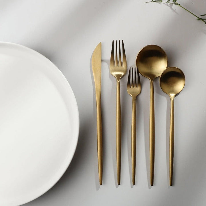 Rose gold Aurora tableware set, a stylish choice for contemporary kitchenware.