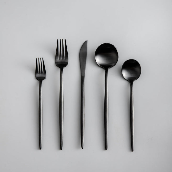 Full view of the Aurora modern cutlery set in mixed finishes, perfect for dining.