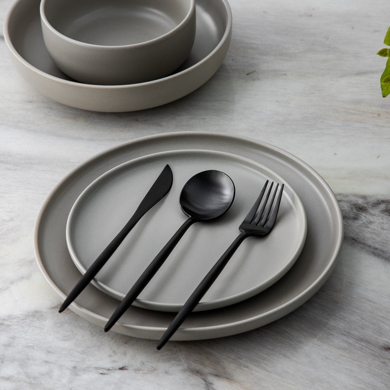 Gold Aurora flatware set, showcasing its minimalist & elegant design.