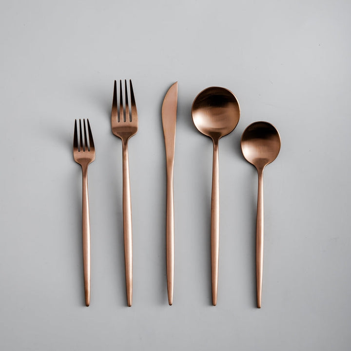 Modern black Aurora flatware, complementing any stylish dinnerware setting.