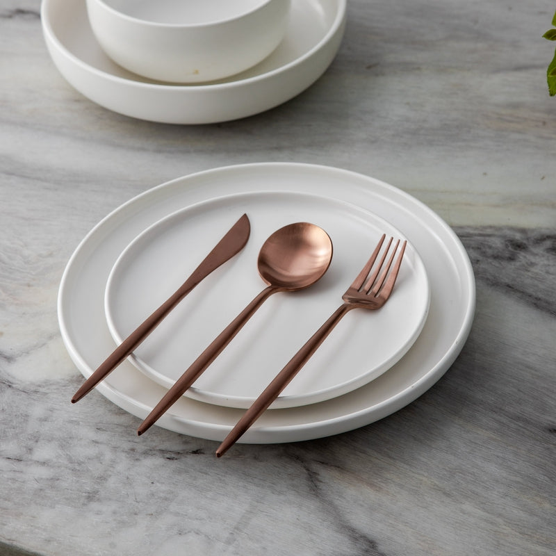 Rose gold Aurora cutlery set, a timeless piece of elegant kitchenware.