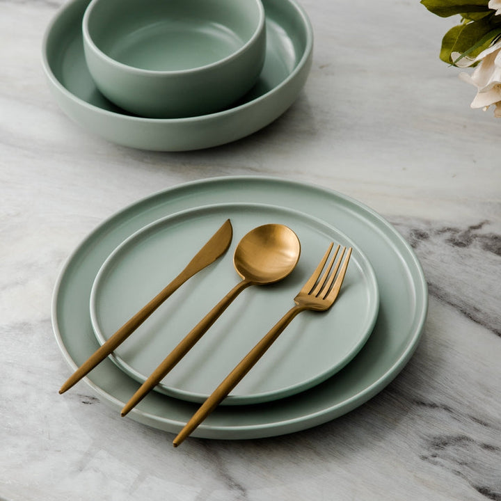 Sleek black Aurora cutlery set for contemporary kitchenware & elegant tableware.