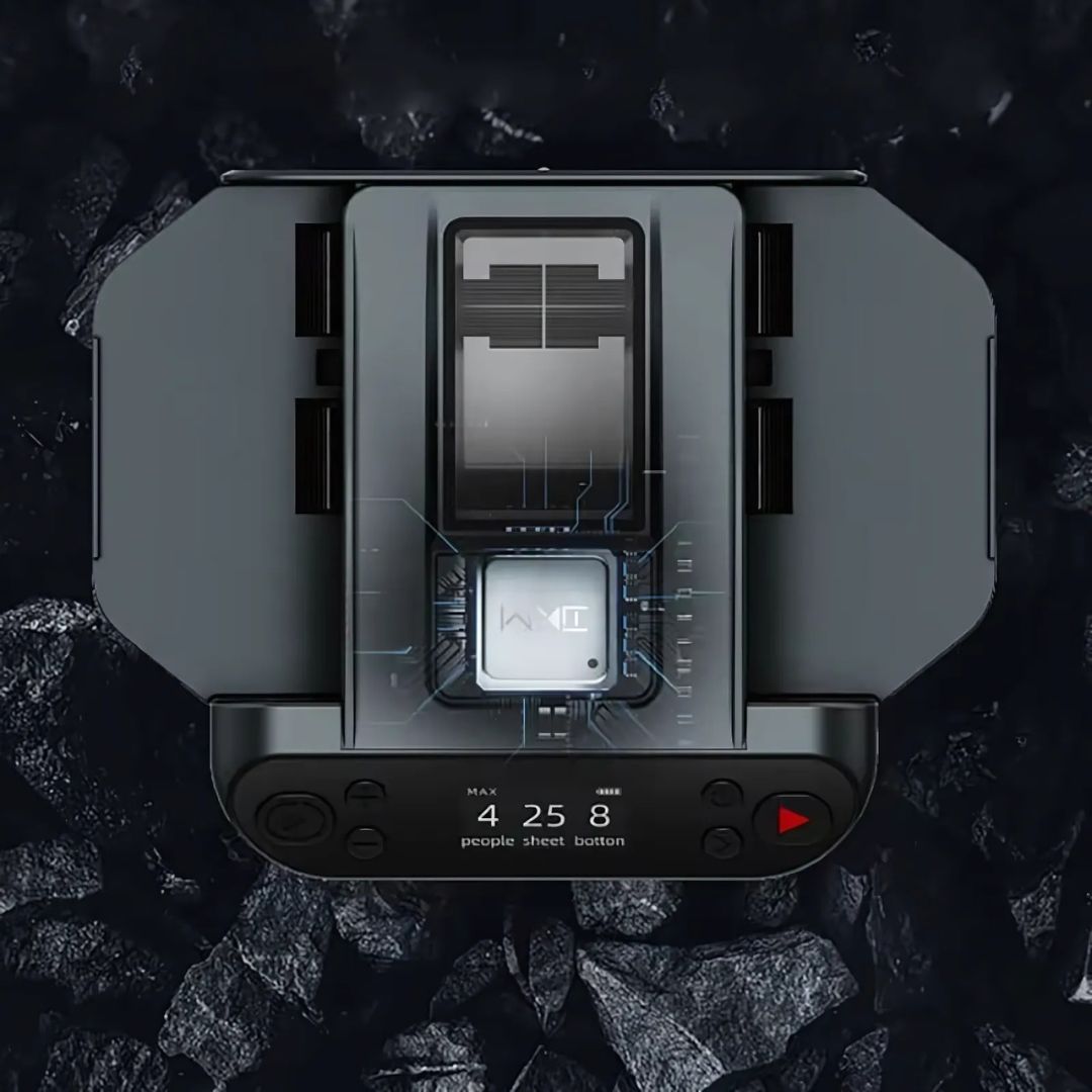 Hand placing cards into the automatic shuffler and dealer for quick game setup.